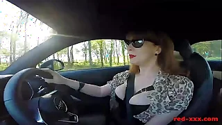 British mature Red fingers her cunt in the car again